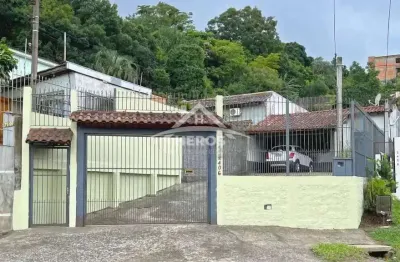 Casa com 3 quartos à venda na avenida vicente monteggia, 2406, cavalhada, porto alegre por r$ 495.000