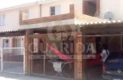 Casa em condomínio fechado com 2 quartos à venda na rua atílio supertti, 580, vila nova, porto alegre por r$ 200.000