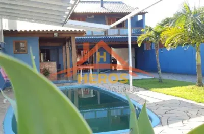 Casa com 4 quartos à venda na rua jerolomo minuzo, 317, vila nova, porto alegre por r$ 800.000