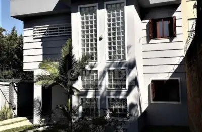 Casa com 4 quartos à venda na avenida jacuí, 1229, cristal, porto alegre por r$ 1.100.000