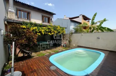 Casa com 3 quartos à venda na rua attilio bettio, 92, aberta dos morros, porto alegre por r$ 585.000