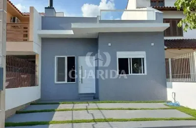 Casa com 2 quartos à venda na rua paulo rogério amoretty souza, 40, hípica, porto alegre por r$ 497.000