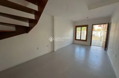 Casa em condomínio fechado com 2 quartos para alugar na Rua Doutor Paulino Guerra, 329, Jardim Itu Sabará, Porto Alegre, 102 m2 por R$ 3.150