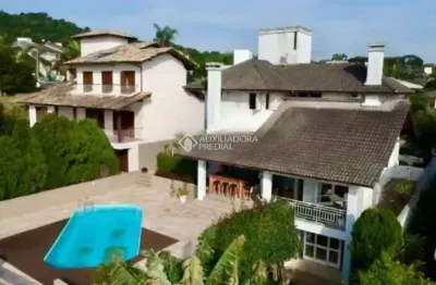 Casa em condomínio fechado com 3 quartos à venda na rodovia haroldo soares glavan, 3820, cacupé, florianópolis, 290 m2 por r$ 2.940.000