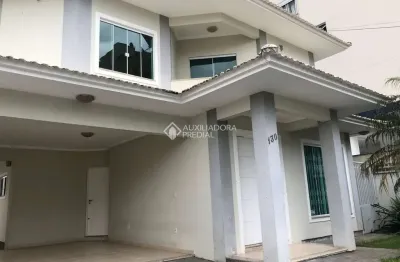 Casa com 4 quartos à venda na rua bolonha, 130, pagani, palhoça, 300 m2 por r$ 1.200.000