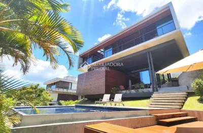 Casa em condomínio fechado com 3 quartos à venda na Rodovia Haroldo Soares Glavan, 4690, Cacupé, Florianópolis, 319 m2 por R$ 7.850.000
