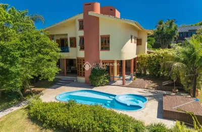 Casa em condomínio fechado com 5 quartos à venda na rua vereador osni ortiga, 2991, lagoa da conceição, florianópolis, 350 m2 por r$ 6.890.000