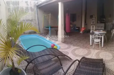 Casa com 4 quartos à venda na Rua Coronel Carlos Domingues Guimarães Ambrogi, 329, Jardim Sonia Maria, Taubaté, 151 m2 por R$ 380.000