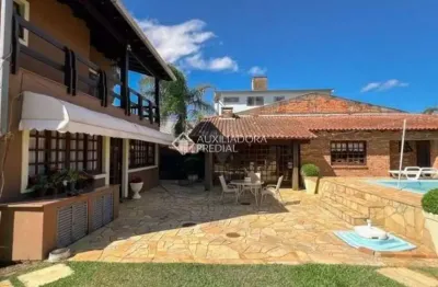 Casa com 4 quartos à venda na rua bernardino de oliveira fonseca, 215, centro, gravataí, 340 m2 por r$ 2.300.000