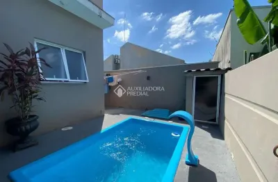 Casa com 3 quartos à venda na rua alcides gomes, 10, parque dos anjos, gravataí, 128 m2 por r$ 630.000