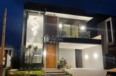 Casa em condomínio fechado com 3 quartos à venda na rua adolfo inácio de barcelos, 1490, centro, gravataí, 270 m2 por r$ 2.450.000