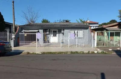 Casa com 3 quartos à venda na Rua Dom Vitório Monego, 312, Cruzeiro, Gravataí, 145 m2 por R$ 373.000