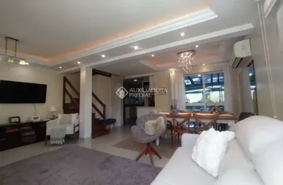 Casa em condomínio fechado com 3 quartos à venda na rua vicenza, 21, mário quintana, porto alegre, 220 m2 por r$ 600.000