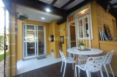 Casa em condomínio fechado com 3 quartos à venda na rua vicenza, 21, mário quintana, porto alegre, 220 m2 por r$ 600.000