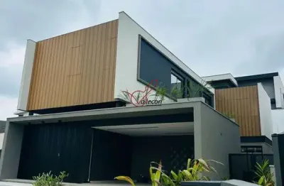 Casa hiato - um lar de sofisticação e conforto no condomínio alphaville 2.