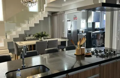 Casa maravilhosa a venda dentro de condomínio fechado com 04 quartos 03 suítes piscina churrasqueira