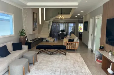 Casa maravilhosa a venda dentro de condomínio fechado com 04 quartos 03 suítes piscina churrasqueira