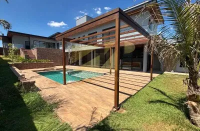 Imóvel de luxo à venda em condomínio exclusivo na reserva petrus, indaiatuba-sp: 4 suítes, 2 salas, 4 vagas de garagem.