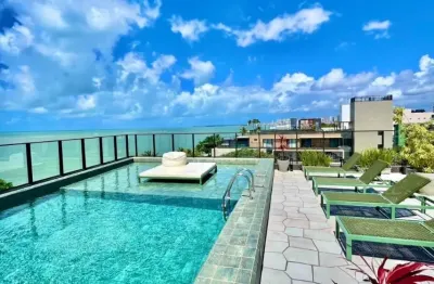 Flat pé na areia em frente as piscinas naturais do caribessa- finamente mobiliado com lazer completo e linda vista mar!