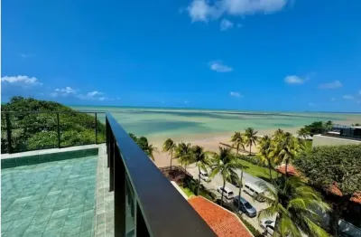 Flat pé na areia em frente as piscinas naturais do Caribessa- Finamente mobiliado com lazer completo e linda vista mar!