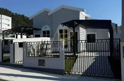 Casa nova à venda: 3 dorm (1 suíte) e área nos fundos- biguaçu