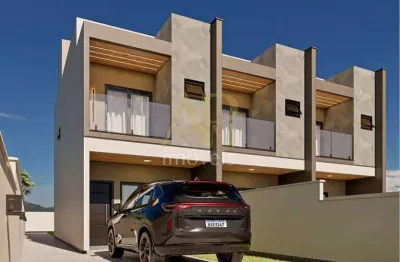 Sobrado à venda: 2 suítes, lavabo, quintal e passagem lateral em areias