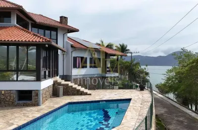 Casa à venda na praia de são miguel, biguaçu/sc, em condomínio fechado.