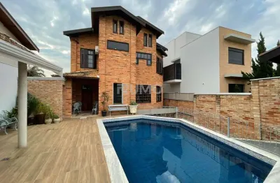 Casa em condomínio fechado com 4 quartos à venda na avenida oswaldo von zuben, 1473, parque da hípica, campinas, 351 m2 por r$ 1.700.000