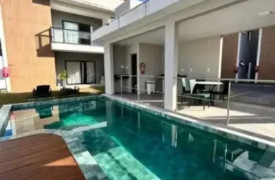 Casa em condomínio com 3 quartos e 2 suítes para venda em miragem lauro de freitas com 2 vagas de garagens condomínio com piscina