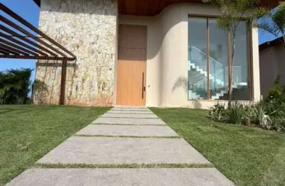 Casa com 8 suítes ampla com piscina na praia do forte no condomínio praia bella para venda com 4 vagas de garagens