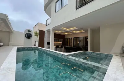 Casa para venda de alto padrão no alphaville salvador 2 com 5 suítes 6 vagas de garagens