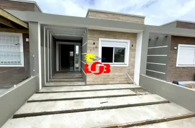 Geminada de 02 dormitórios, em ótima localização na praia de tramandaí, zona nova!