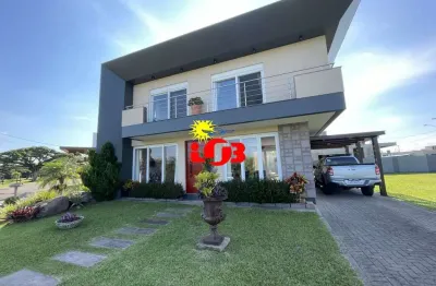 Casa 3 dormitórios suítes, alto padrão em condomínio fechado/tramandaí