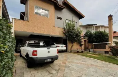 Casa com 4 dormitórios à venda, 312 m² por r$ 2.200.000,00 - alphaville 06 - santana de parnaíba/sp