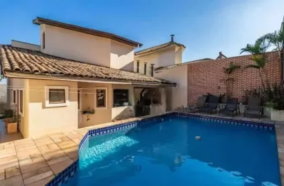 Casa com 4 dormitórios à venda, 334 m² por r$ 2.300.000 - alphaville 06 - santana de parnaíba/sp