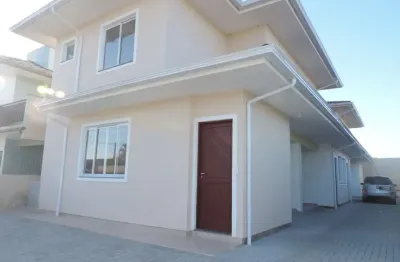 Casa em condomínio fechado com 2 quartos para alugar na rua ipê rosa, 47, carianos, florianópolis por r$ 3.400