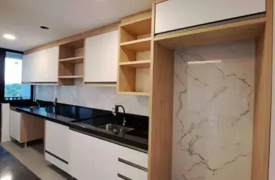 Apartamento térreo mobiliado em piçarras: conforto exclusivo e varanda!