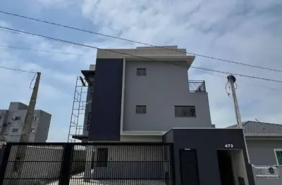 Loft em piçarras  conforto, segurança e excelente localização!