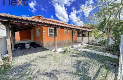 Casa ampla com 6 suítes e terreno espaçoso em localização estratégica!