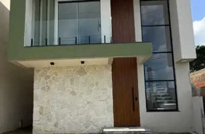 Casa em condomínio fechado com 4 quartos à venda na rodovia ba-099 - estrada do côco km 13, 877, abrantes, camaçari por r$ 900.000