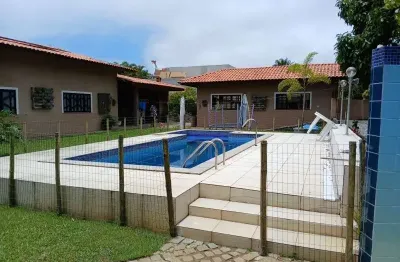 Casa em condomínio fechado com 4 quartos à venda na avenida santos dumont, 8, parque encontro das águas, lauro de freitas por r$ 1.550.000