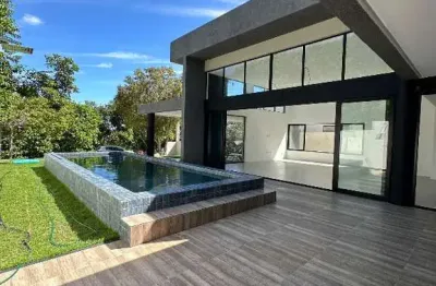 Casa em condomínio fechado com 4 quartos à venda na acesso 05-65, 87, guarajuba, camaçari por r$ 1.100.000