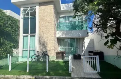 Casa em condomínio fechado com 4 quartos à venda na Avenida Luiz Tarquínio Pontes, 82872, Buraquinho, Lauro de Freitas por R$ 1.150.000