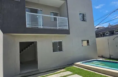 Casa com 3 quartos à venda na Rua Milena Ramone Alencar Ramos, 876, Ipitanga, Lauro de Freitas, 164 m2 por R$ 680.000