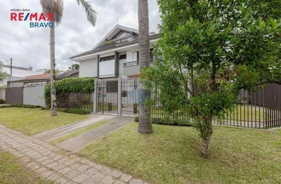 Casa de esquina com quintal no jardim das américas, 4 quartos, 05 vagas de garagem. são 308m2 de muita elegância e conforto.