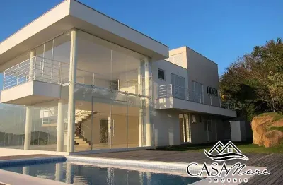 Casa em condomínio fechado com 3 quartos à venda na rodovia haroldo soares glavan, 4000, cacupé, florianópolis por r$ 6.500.000