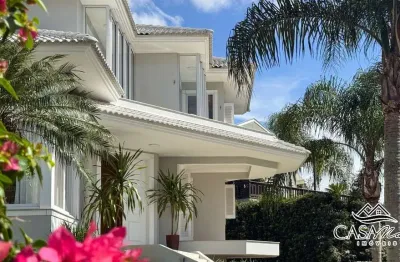 Casa em condomínio fechado com 4 quartos à venda na estrada haroldo soares glavan, 3450, cacupé, florianópolis por r$ 3.700.000