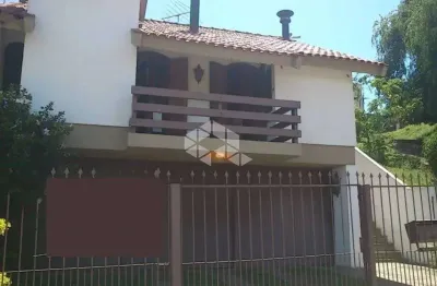 Casa 4 dormitórios com vaga de garagem no bairro jardim lindóia.