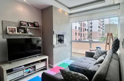Apartamento com dois quartos, churrasqueira e vaga, no sarandi