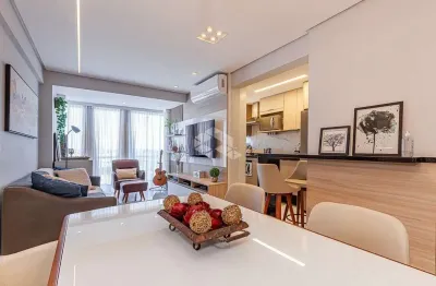 Apartamento com três quartos, duas vagas e churrasqueira